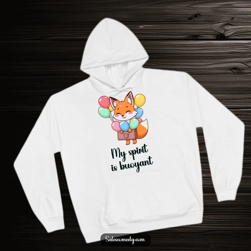 Funny Fox Balloon Briefcase Hoodie: A smiling fox carries a briefcase of balloons, offering cozy cheer, a perfect funny gift.